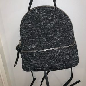 Mini black and silver backpack/ purse